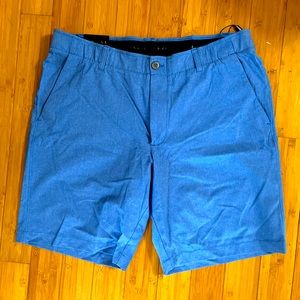 Under Armor size 38 golf/ athletic shorts. Never worn.